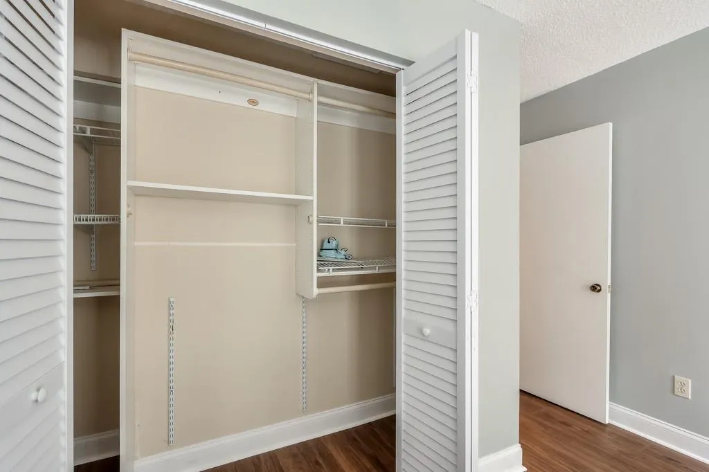 One Of Two Primary Bedroom Closets