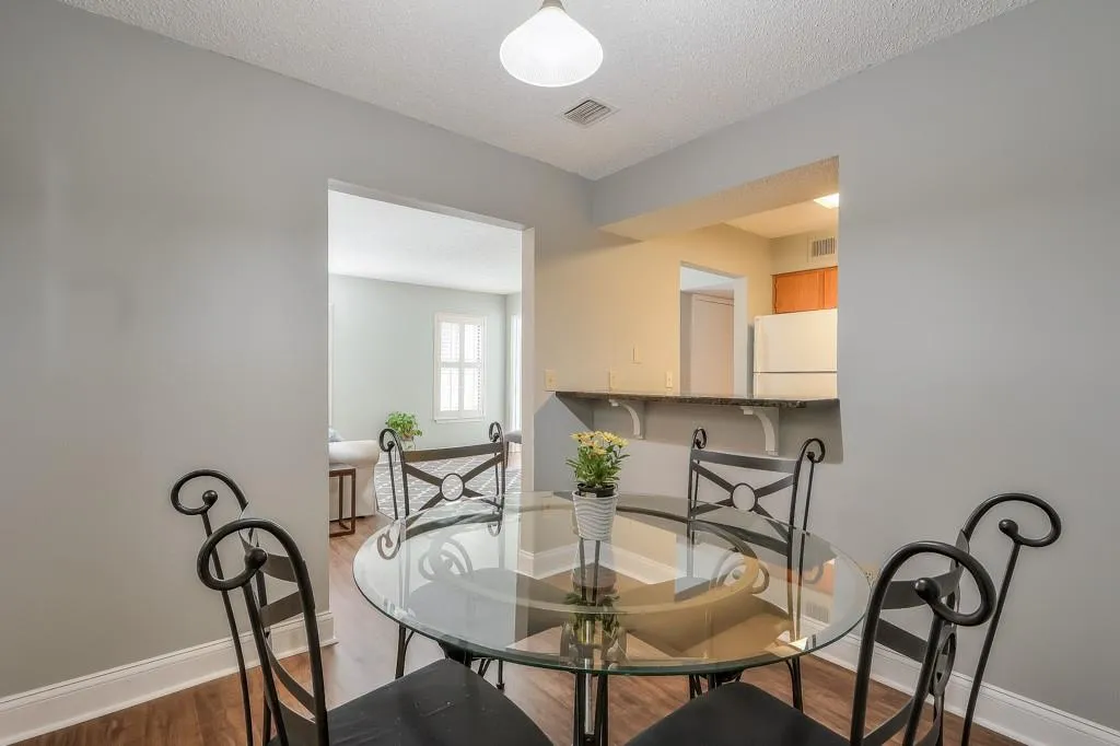 Dining Room Opens To Living Room And Breakfast Bar