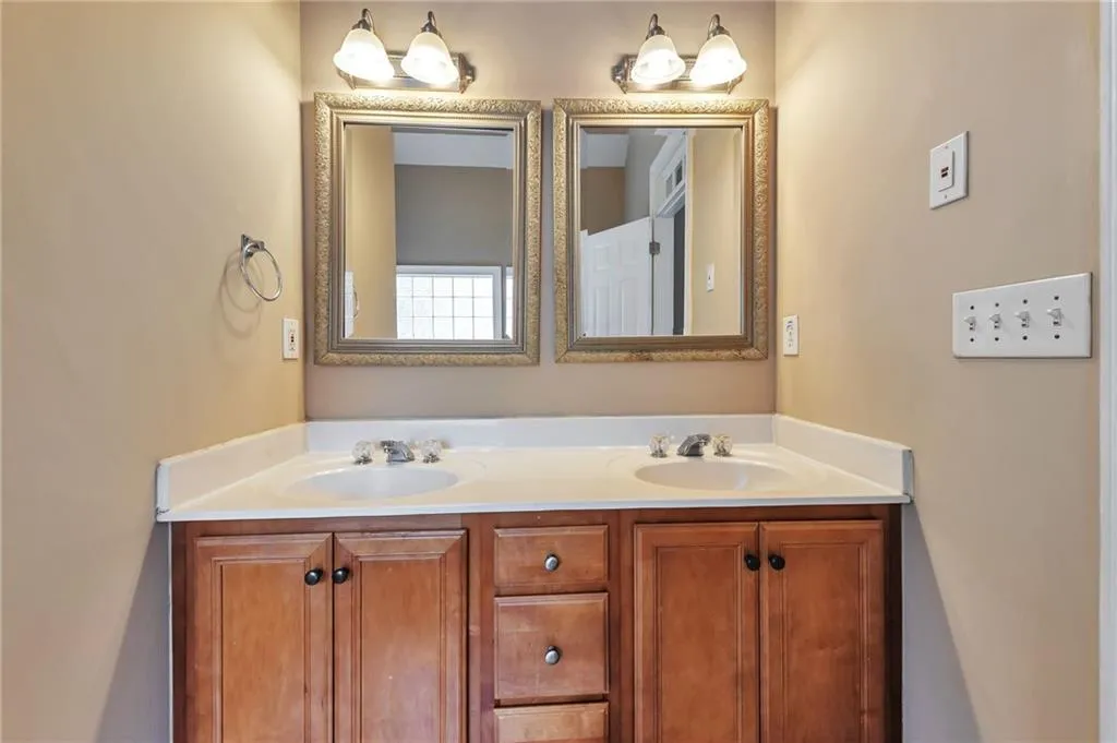 Bathroom featuring double vanity