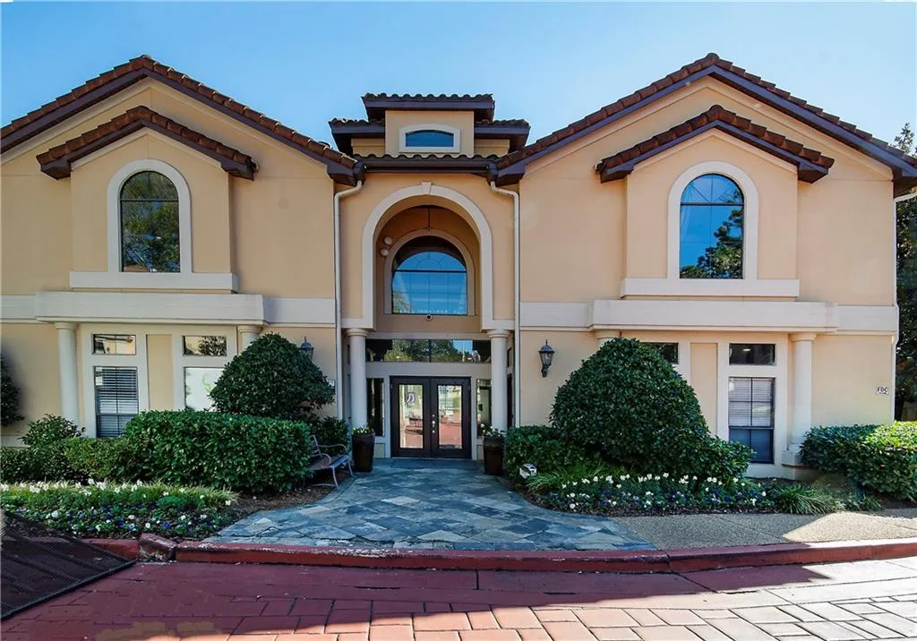 gorgeous club house with work out center, game room, and business center at the front of the complex.  Pool is behind the club house