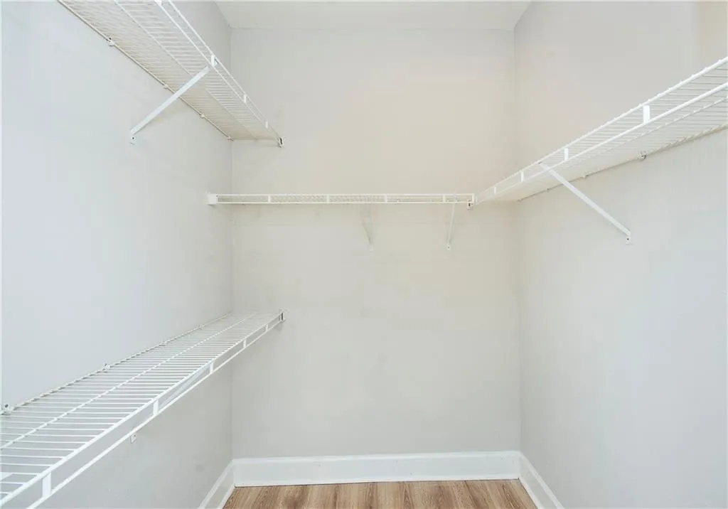 walk in closet in bedroom (same as virtually staged as office option)
