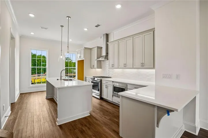 Welcome to the Tayjor 3 bedroom at homesite 324. The large kitchen windows allow for tons of natural light.