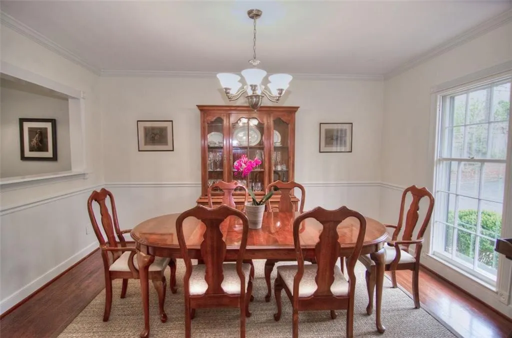Spacious dining room with lots of natural light.