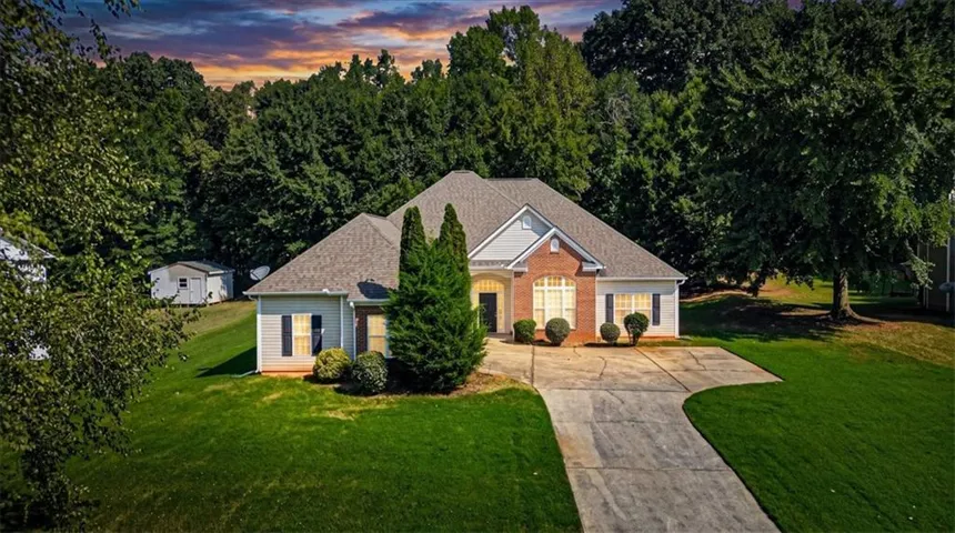 Brick and siding exterior with a gabled roof