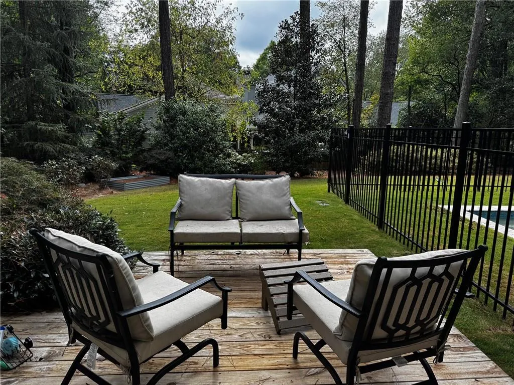 Wooden terrace with an outdoor hangout area