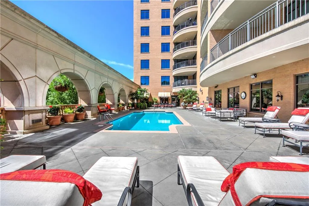 Centrally located pool with plenty of seating and gathering areas