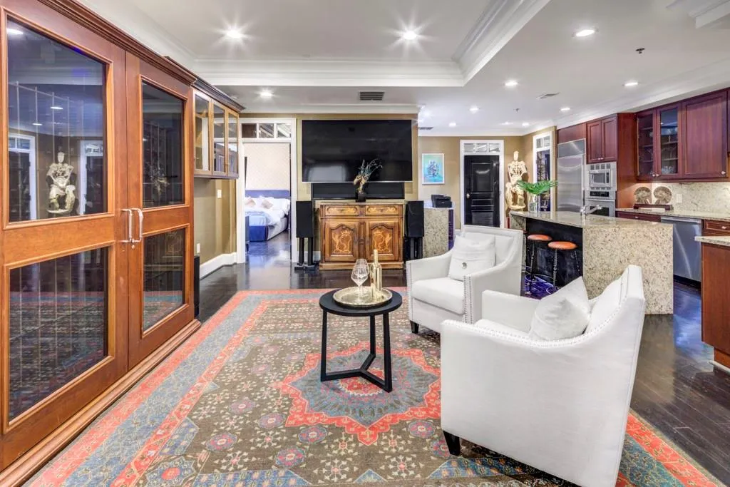 Speakeasy/lounge area with private entrance and additional ensuite guest room.