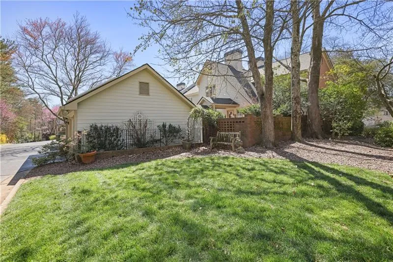 Grassy area adjacent to the home.