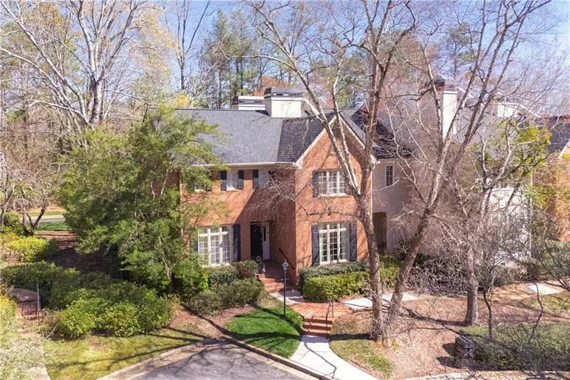 3 sided brick end unit perfectly situated at the very back of the neighborhood.