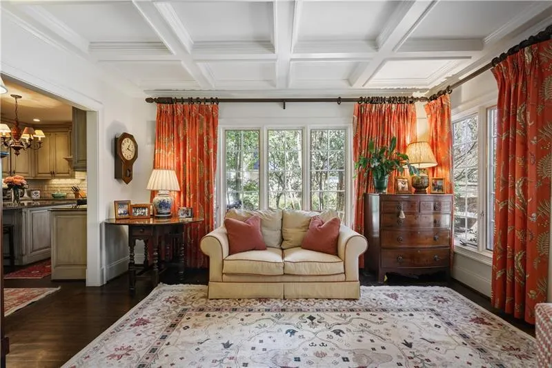 Several seating areas in the large family room.