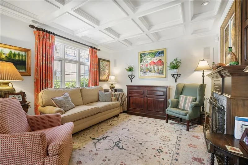 Oversized family room with couffered ceilings.