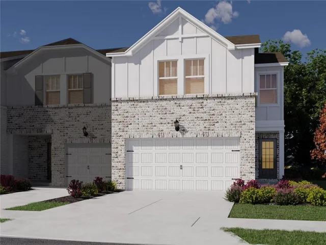 Modern farmhouse facade featuring light brick and white vertical siding