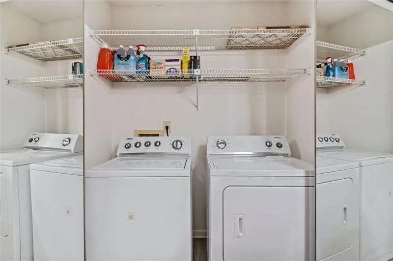 Laundry area with independent washer and dryer Laundry area with independent washer and dryer