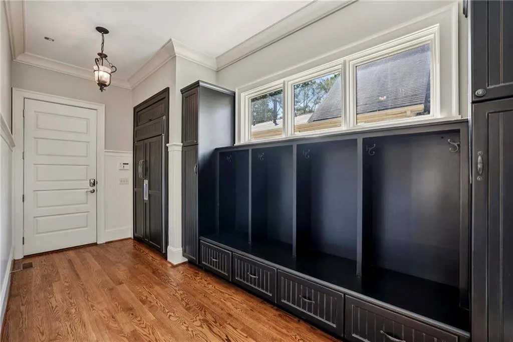 Wonderful mud room with lots of storage and extra full size frig.