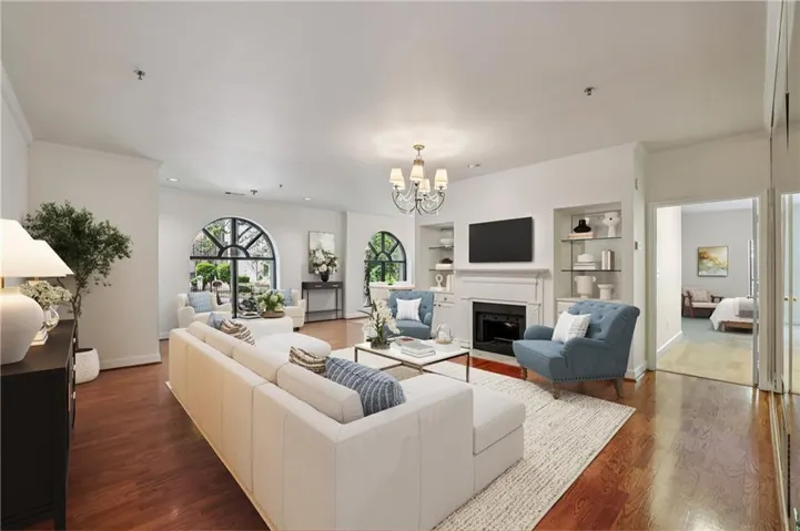 Beautiful light-filled living room in this large condo! (This room has been virtually staged.)