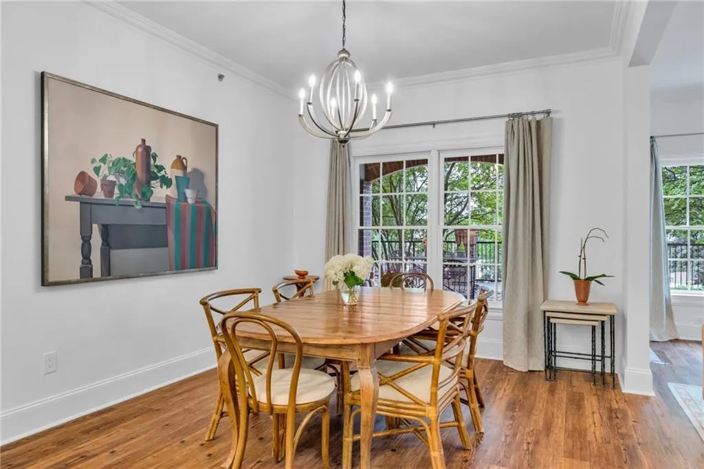 The dining area is open to the living and kitchen areas