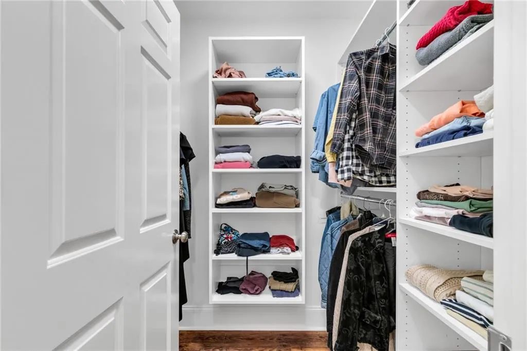 1 of 2 walk-in closets in primary bedroom
