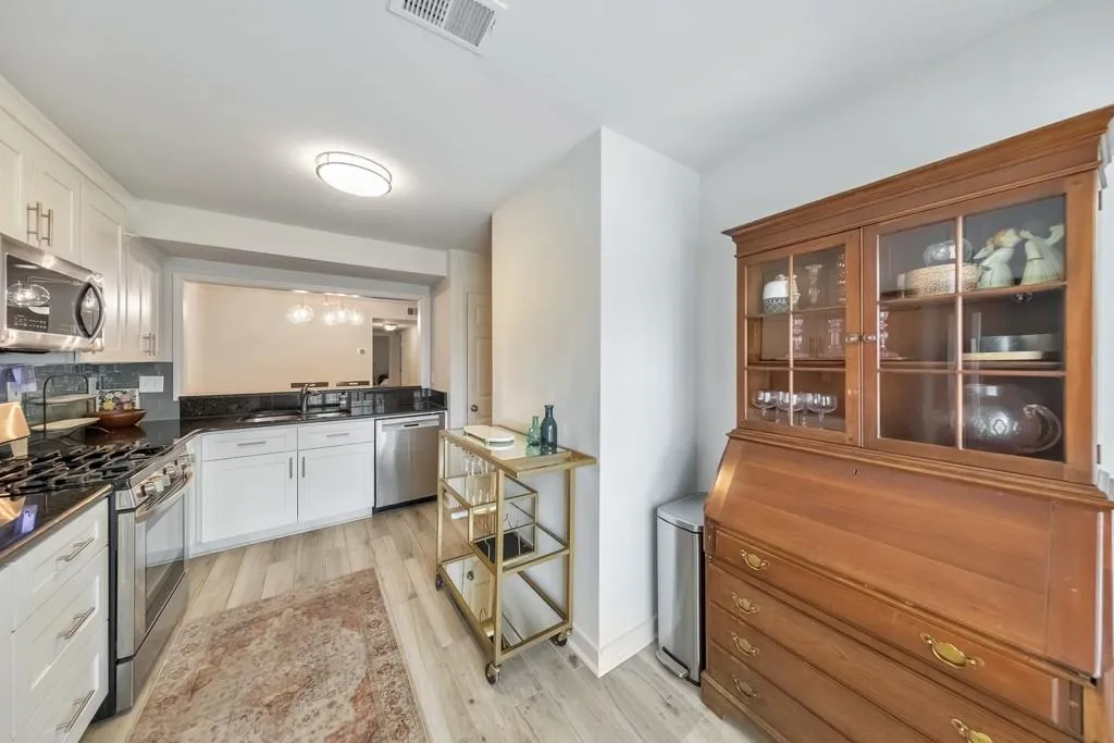 KITCHEN WITH VIEWS TO DINING ROOM