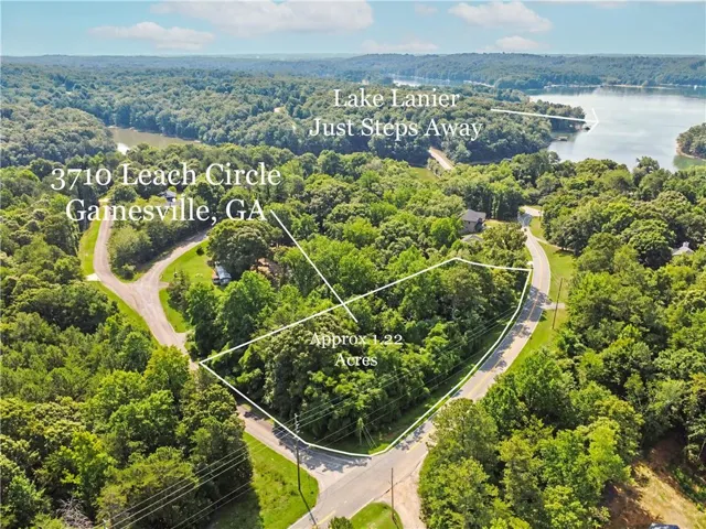Expansive 1.22-acre wooded lot featuring road frontage and mature trees