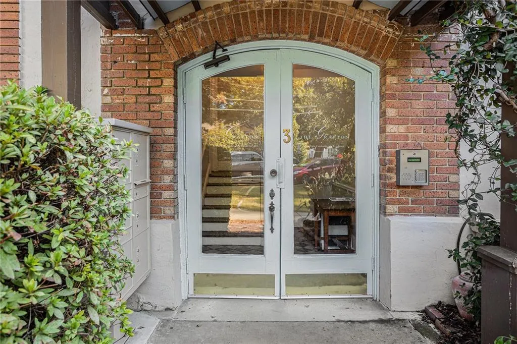 Doorway to property featuring french doors
