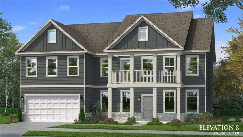 Two-story residence featuring a prominent front-load garage, dark gray siding, and a second-story balcony
