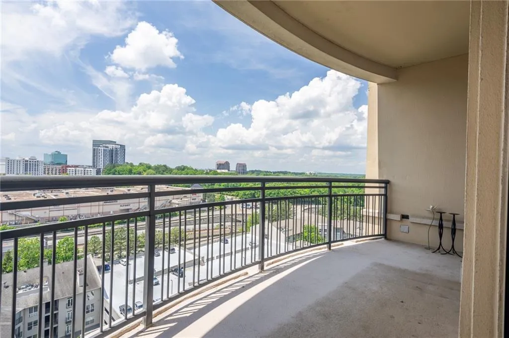 Balcony featuring a view of city