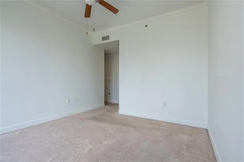 Another view of primary bedroom