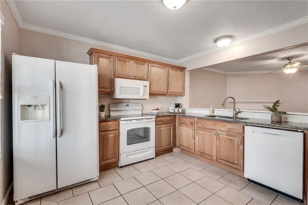 Open concept with view into fireside family room Open concept with view into fireside family room
