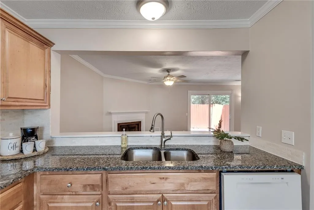 Open concept with view into fireside family room Open concept with view into fireside family room