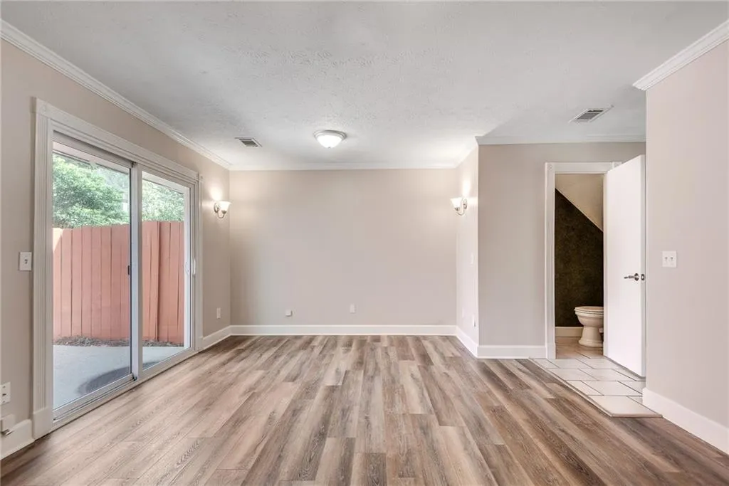 The dining area is off the family room. The dining area is off the family room.