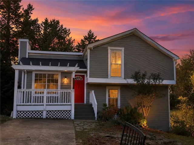 Gray siding exterior with white trim