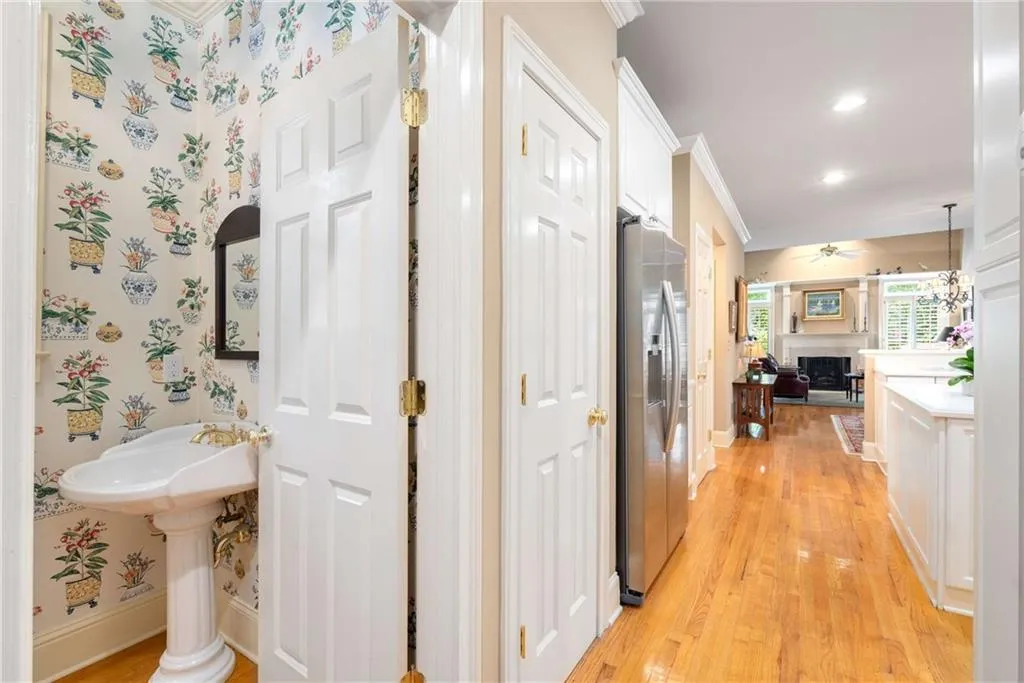 Powder room and laundry room with sink round out the main floor