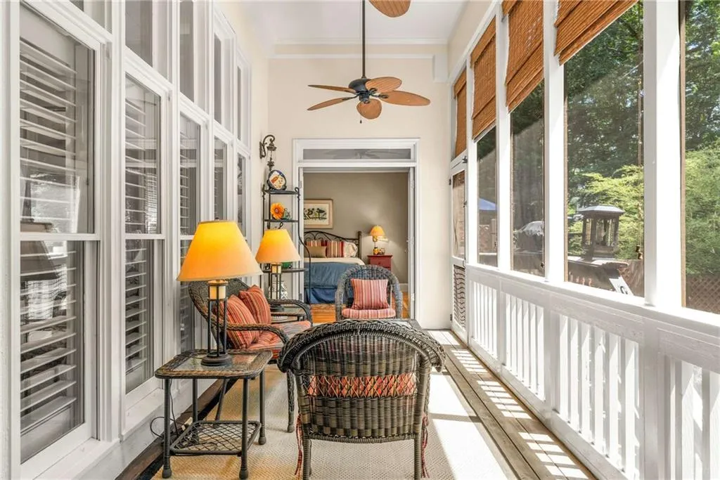 Screen porch overlooks the courtyard back yard and the pool