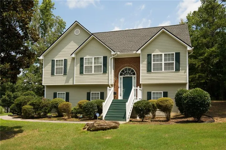 Traditional plan with screened porch on half acre lot..