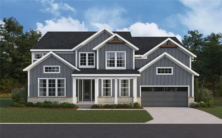 Contemporary two-story residence featuring a dark gray shingle roof, gray vertical siding, white trim, and a stone facade foundation
