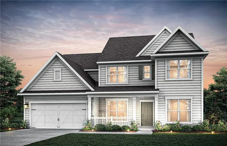 Two-story residence featuring light gray siding with dark green window shutters