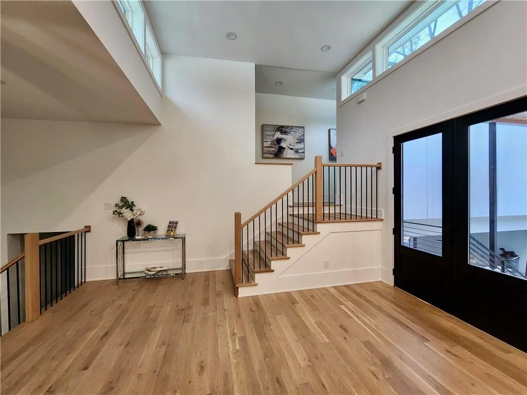 Step inside to 14 foot ceilings and tons of light everywhere