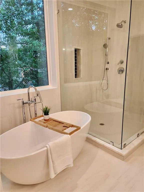 Soaking tub and Glass surround shower