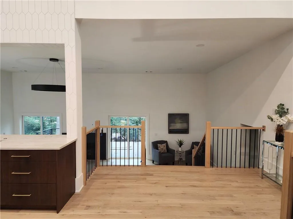 Left of entry is kitchen, scullery, dining rm, 2 BR , bath and laundry