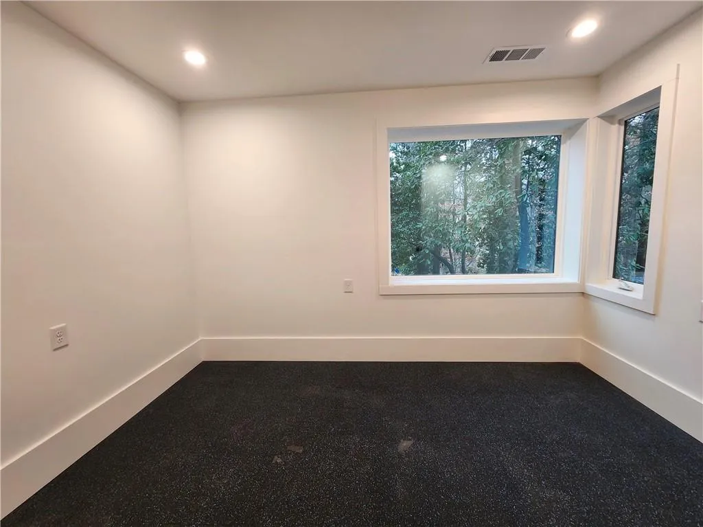 The lower level Gym is kitted with the rubber gym connective tiles for soft landings.