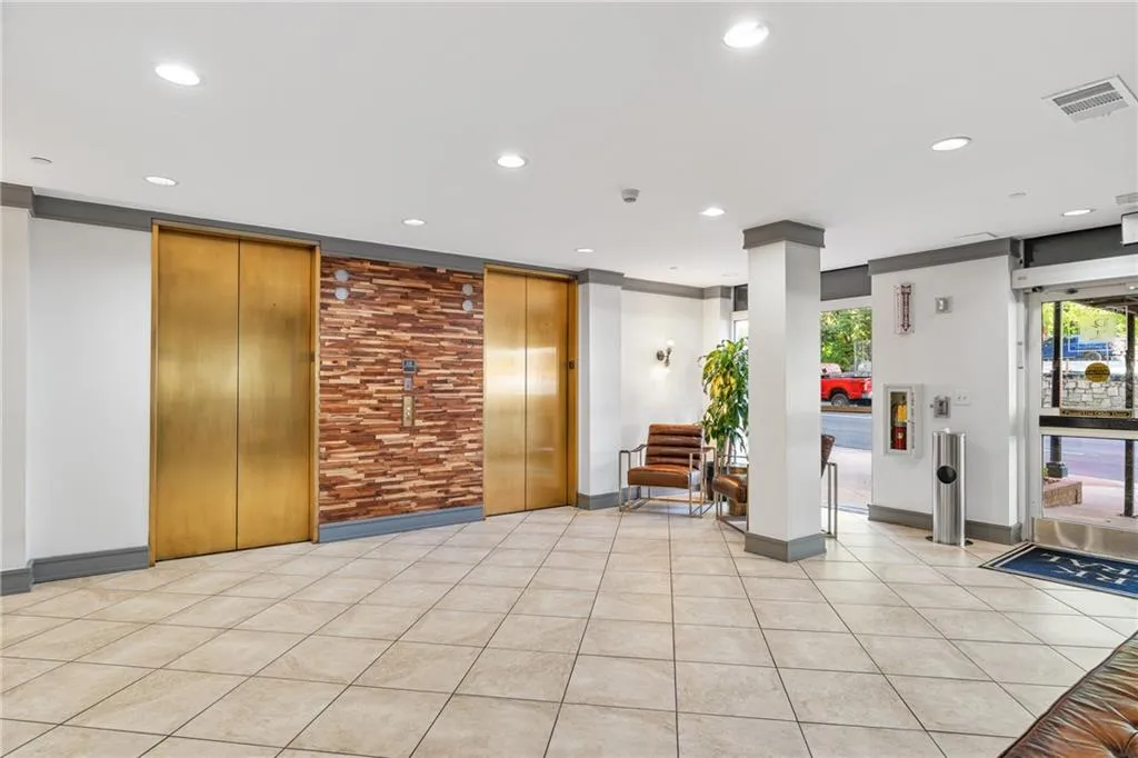 Community lobby featuring recessed lighting