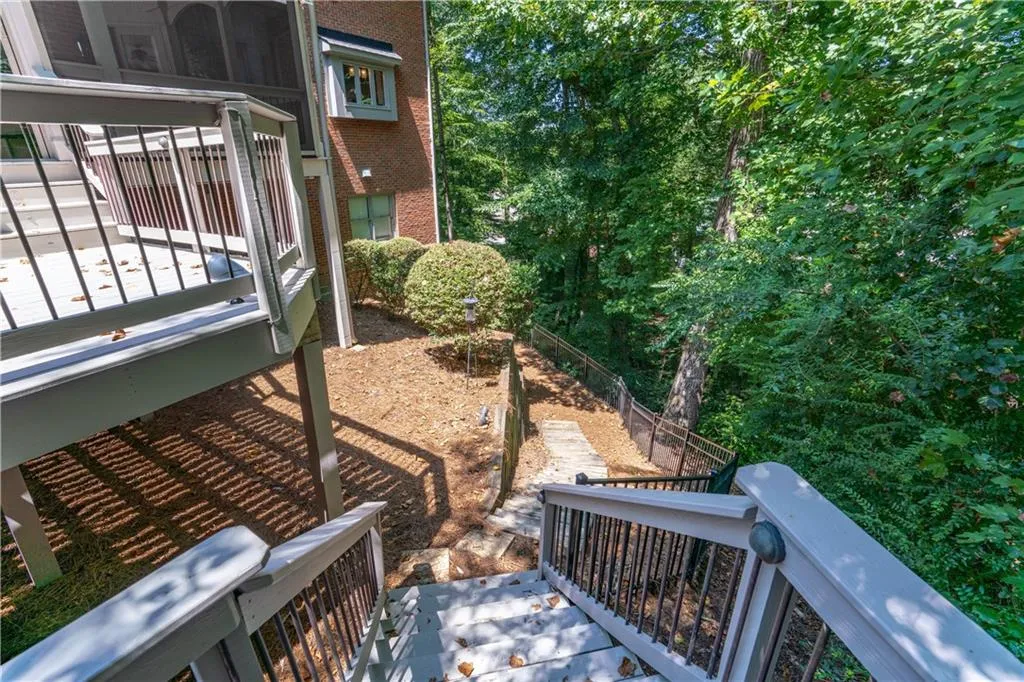 View of side yard with new landscaped retaining wall