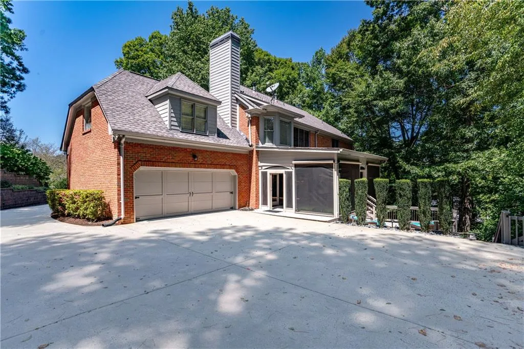 View of property exterior featuring 2-car garage