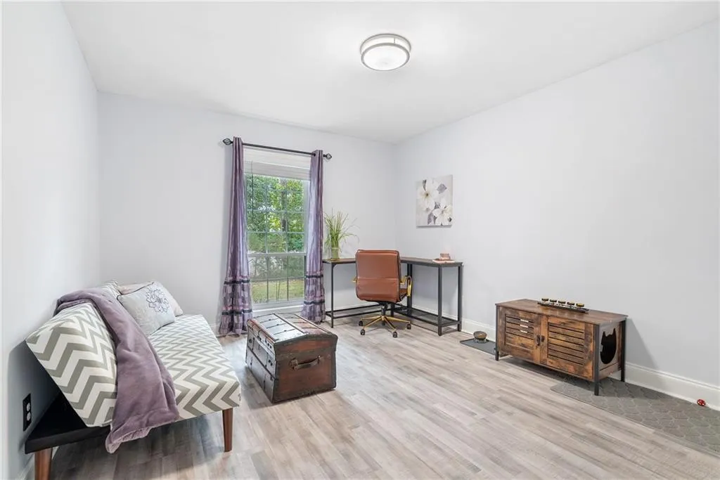 Home office featuring light hardwood / wood-style flooring