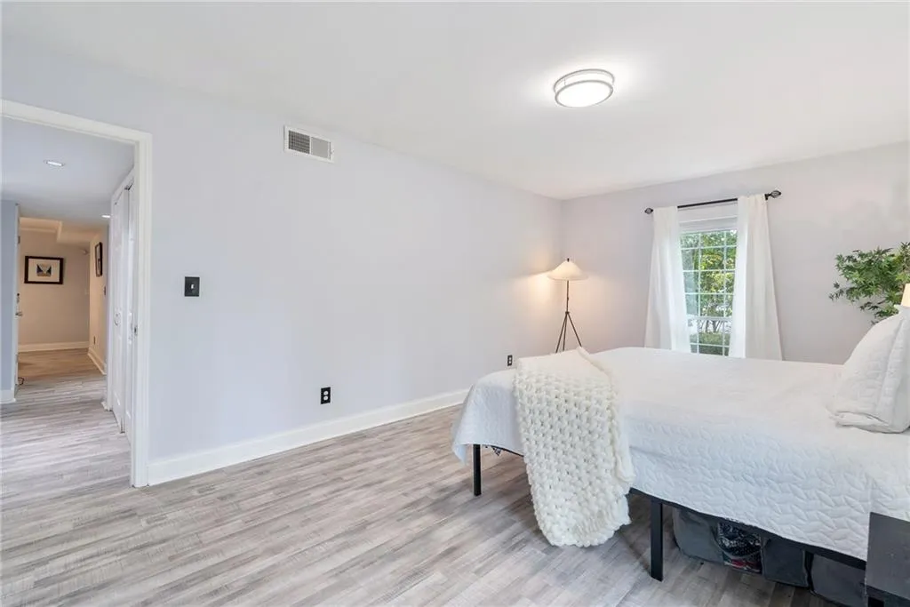 Bedroom with light wood-type flooring