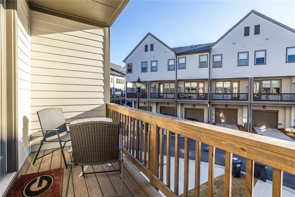 Wooden deck with a residential view