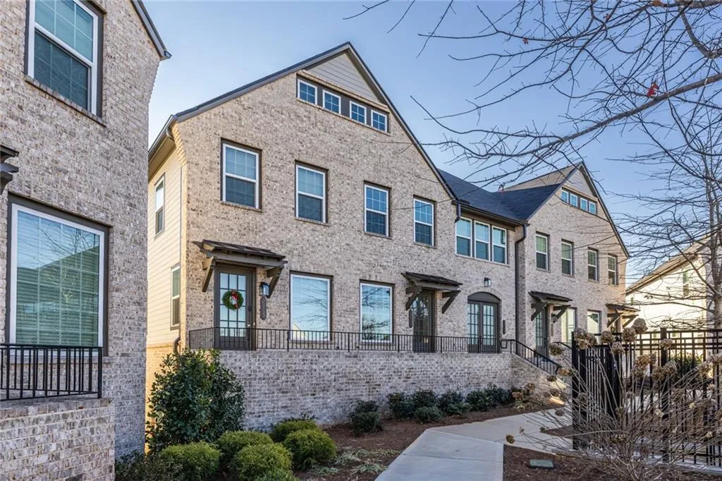 View of front of house with brick siding