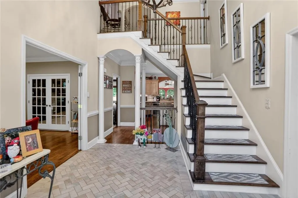 Two story Entrance with Beautiful staircase