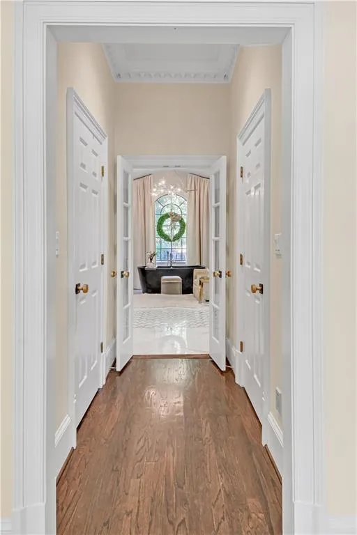 Entry hallway to main level primary bathroom
