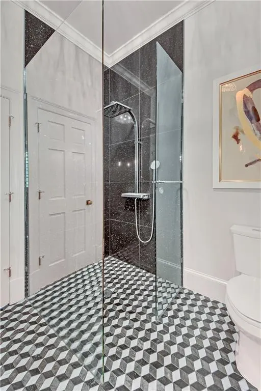 Full bathroom with direct access to backyard